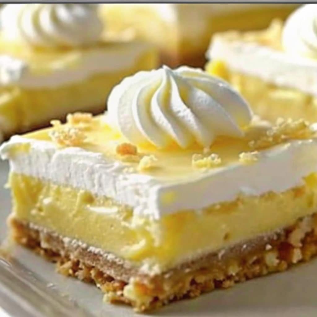 Lazy Day Lemon Cream Pie Bars – Easy No-Bake Dessert for Summer 7 slice of lazy day lemon cream pie bar served